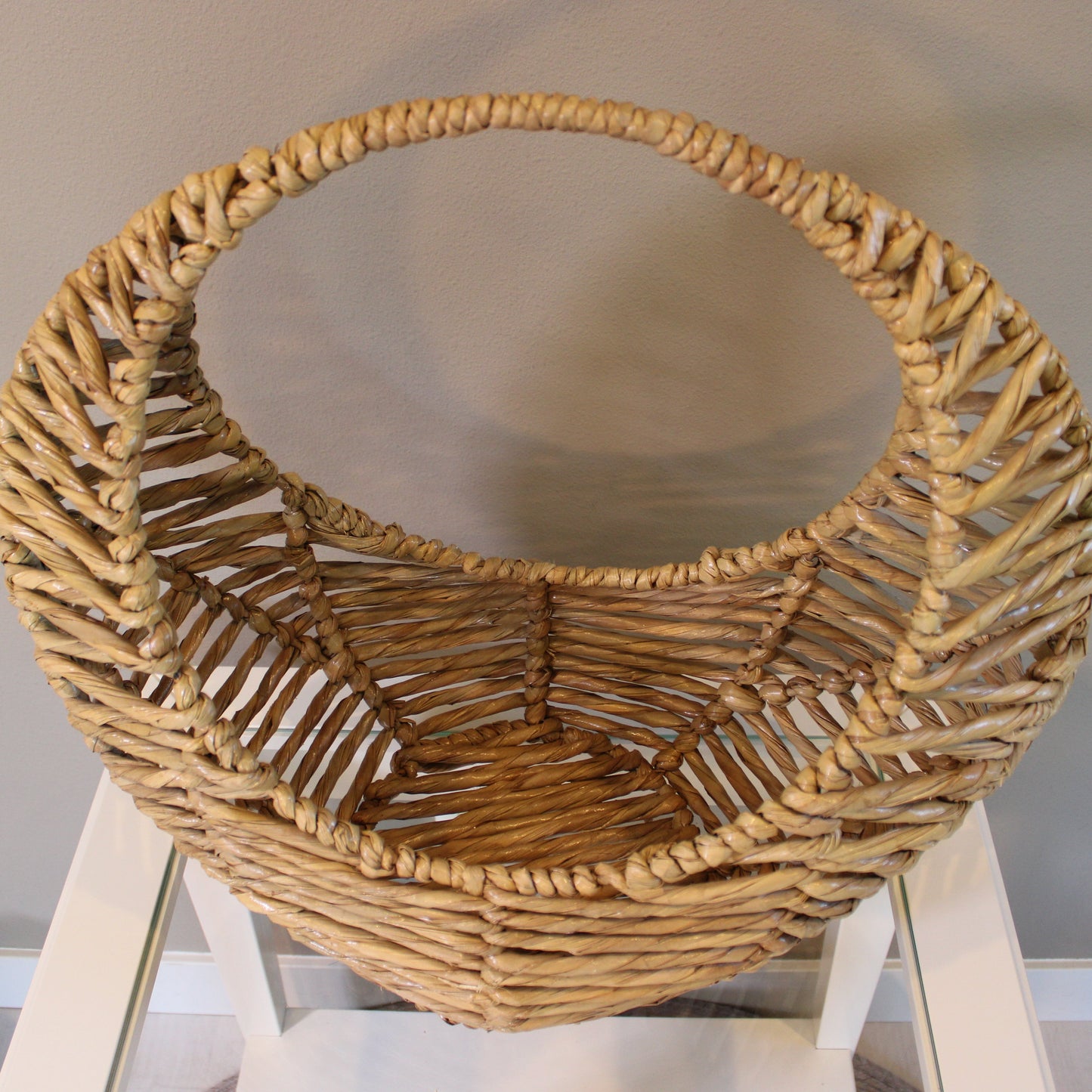 Handwoven rounded storage basket in natural reed Chuspata - Mexican artisan organization