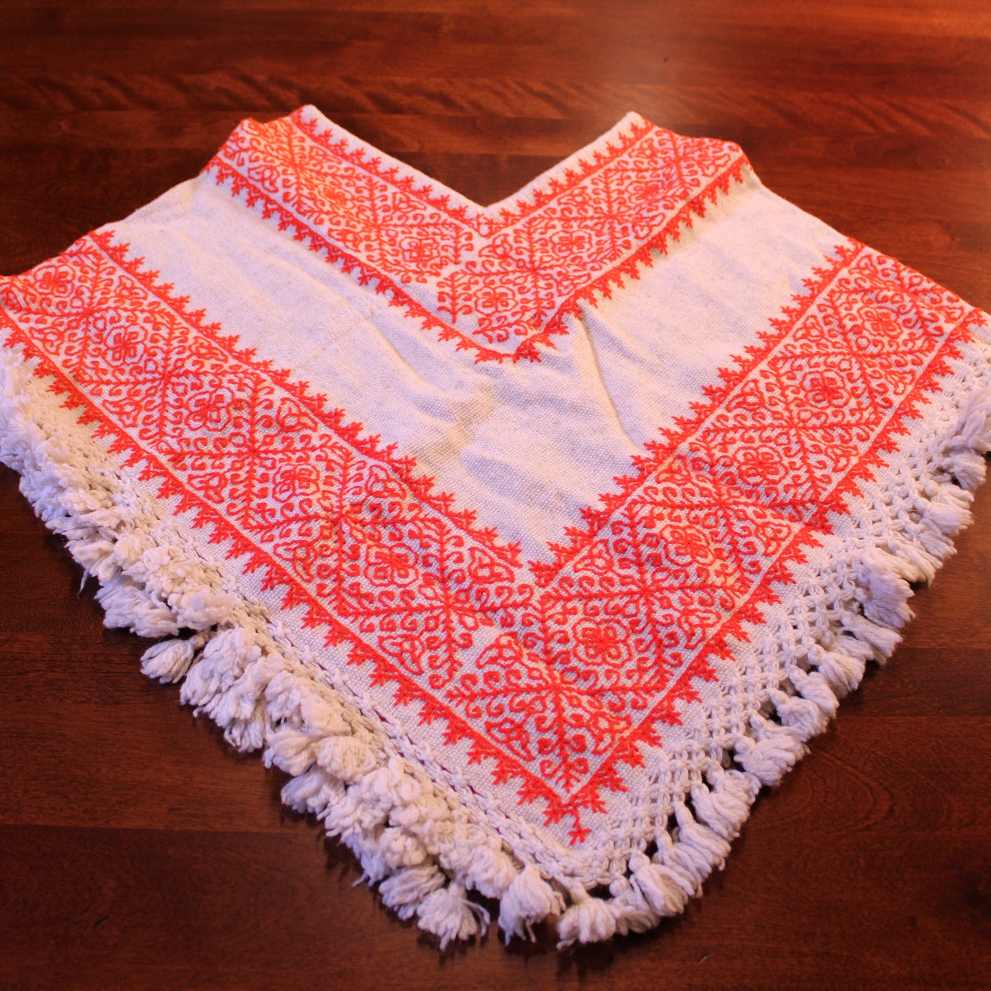 Hand embroidered poncho orange and white