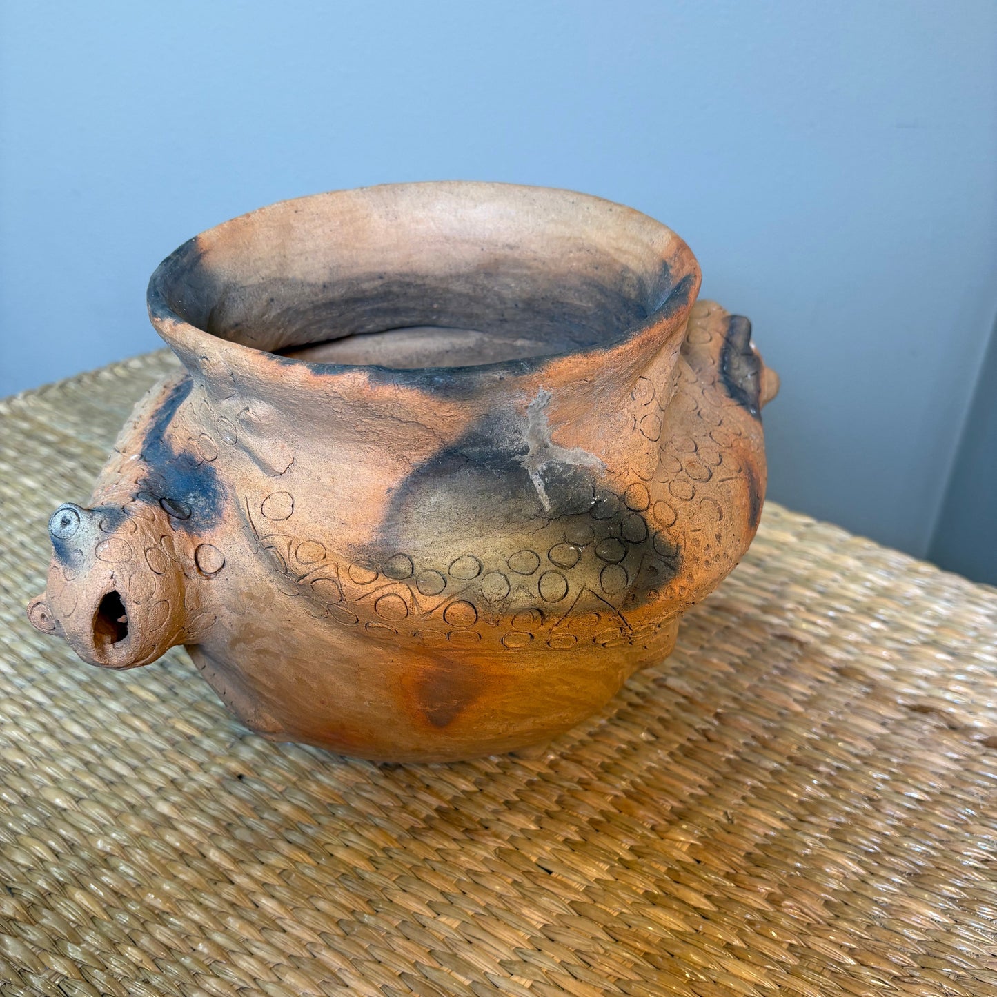 Clay Vase is designed for decorative use. It's natural , porous clay may allow moisture to seep.