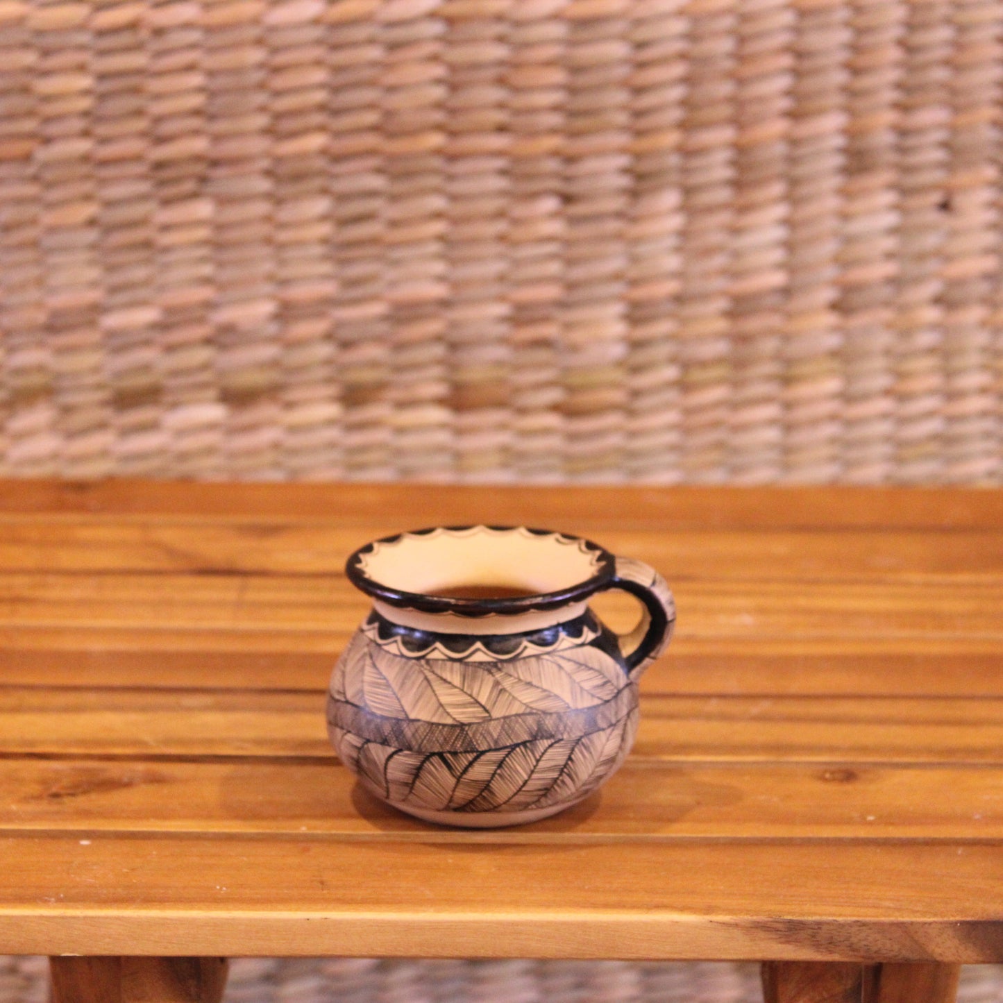 Little cup with handle hand painted in color black and beige