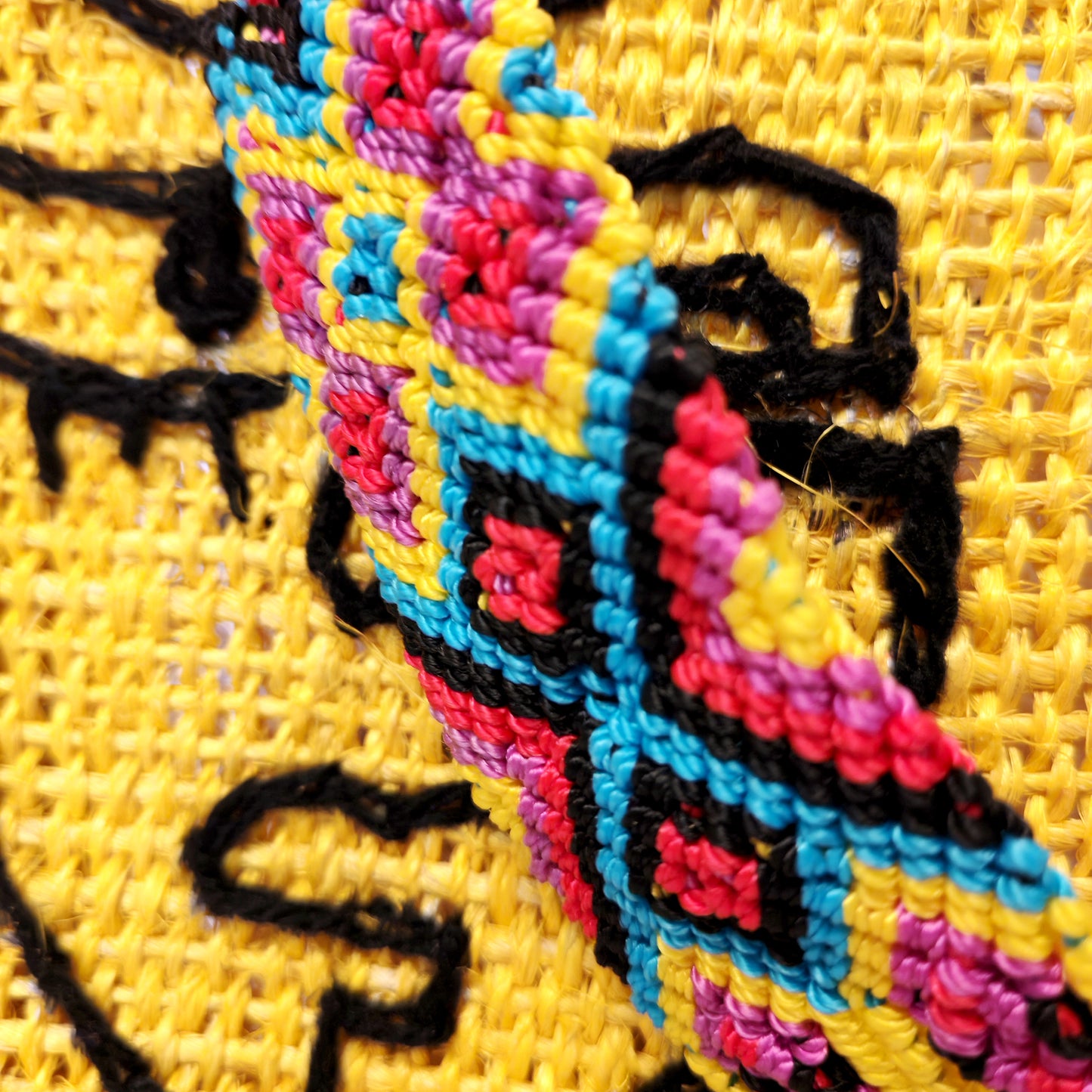Vibrant jute handbag close-up - eco-friendly Mexican artisan bag