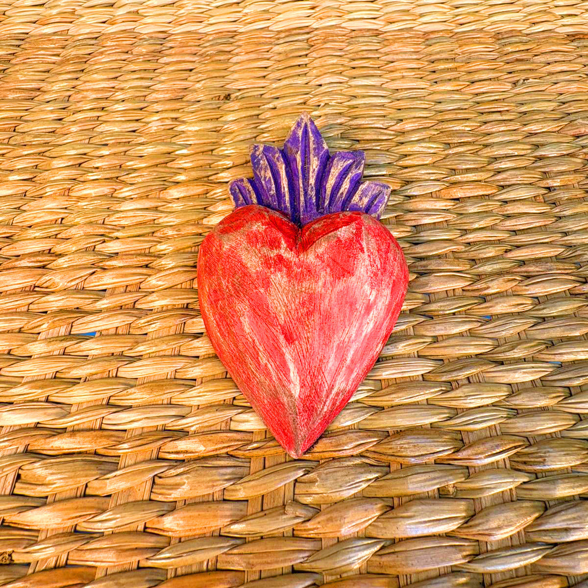 Carved wood heart hand painted.