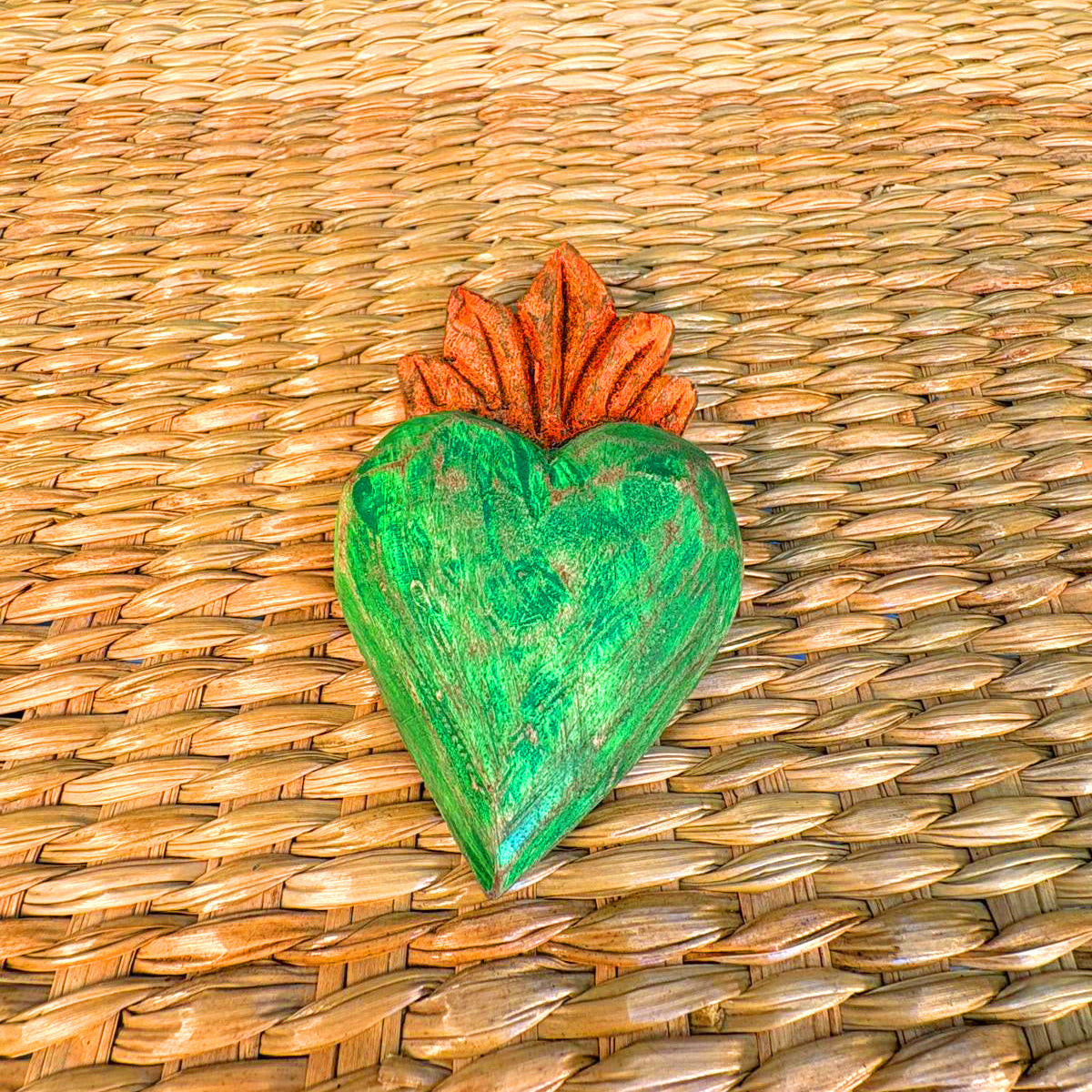 Carved wood heart hand painted.