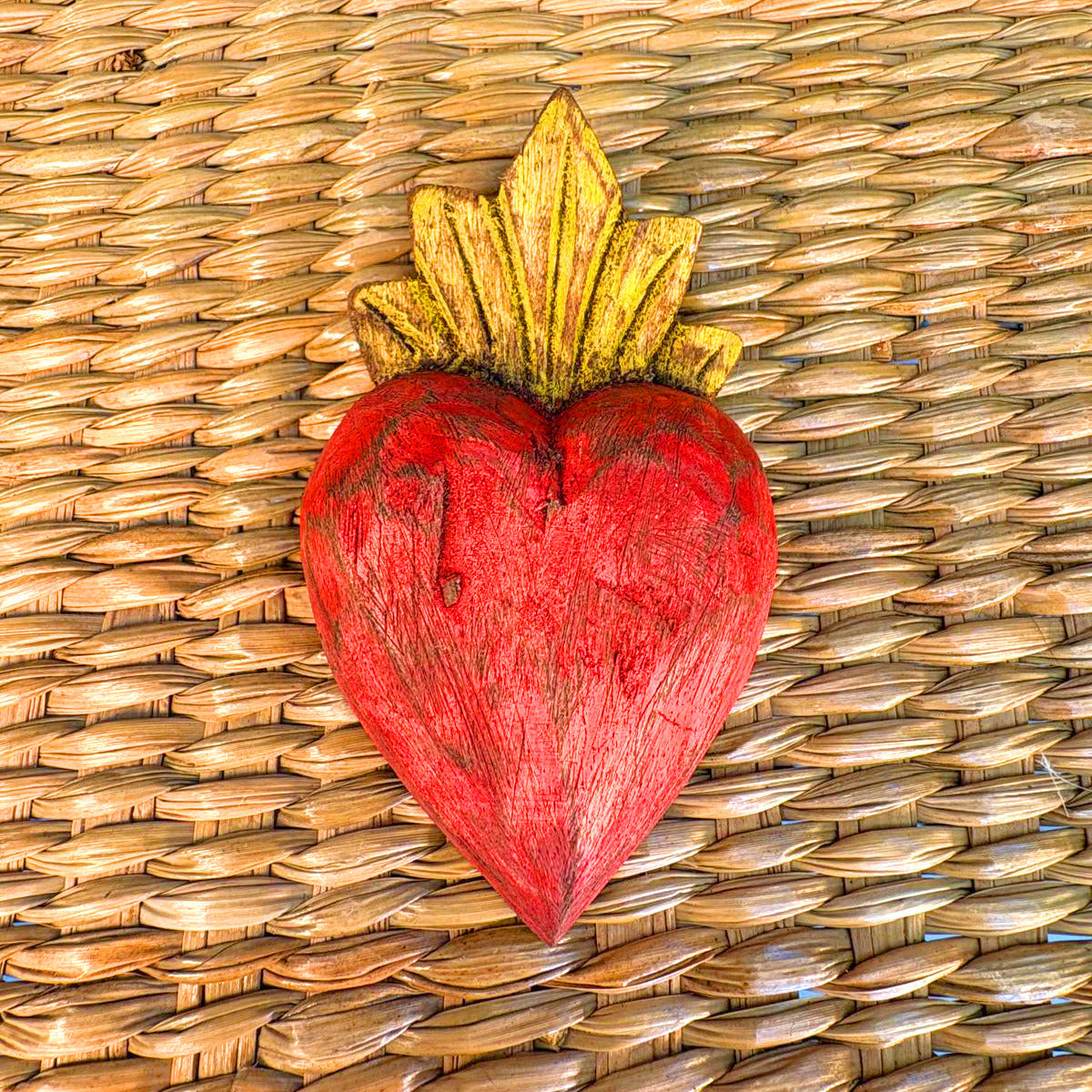 Carved wood heart hand painted.
