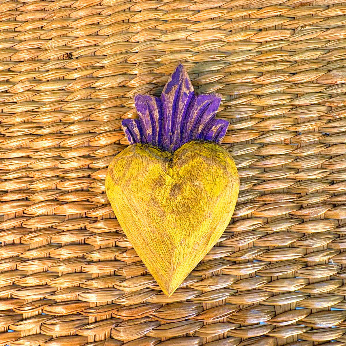 Carved wood heart hand painted.