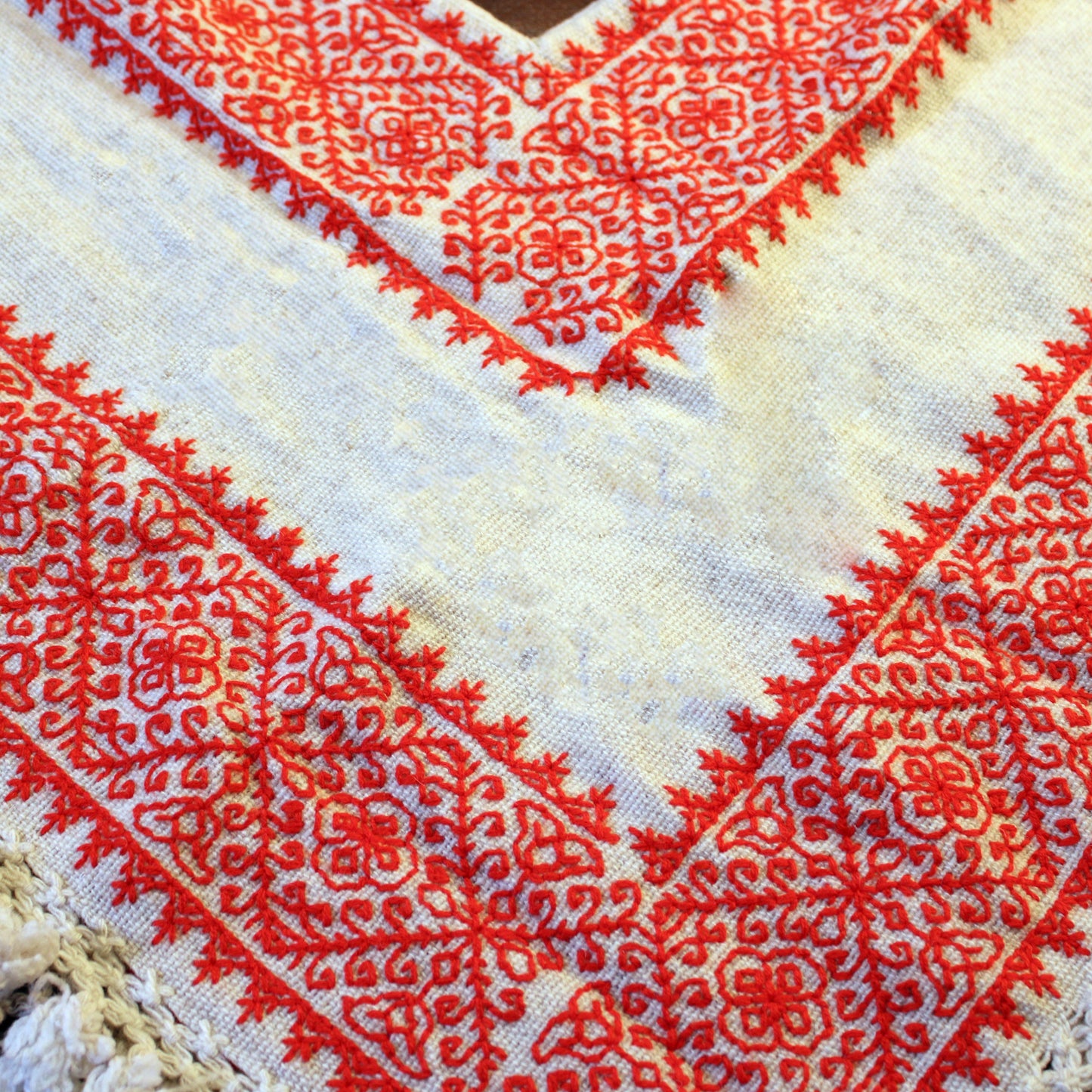 Hand embroidered poncho orange and white