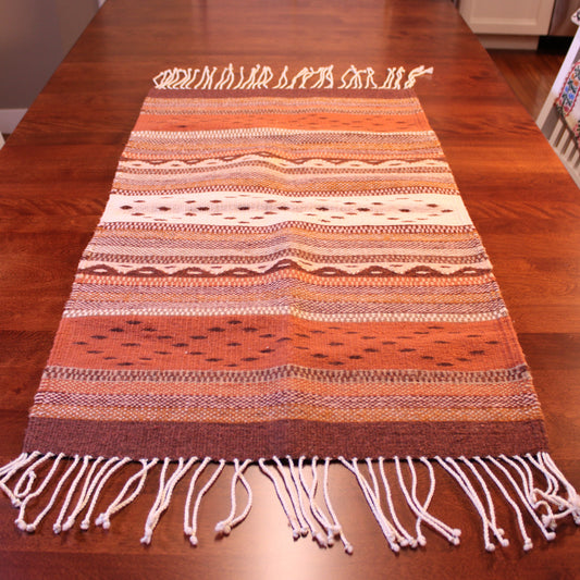Wool rug in brown colors