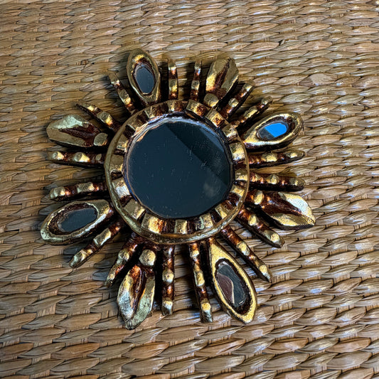 Sunburst Wall Mirror featuring handc-carved wood with gold leaf and glass accents. size Medium