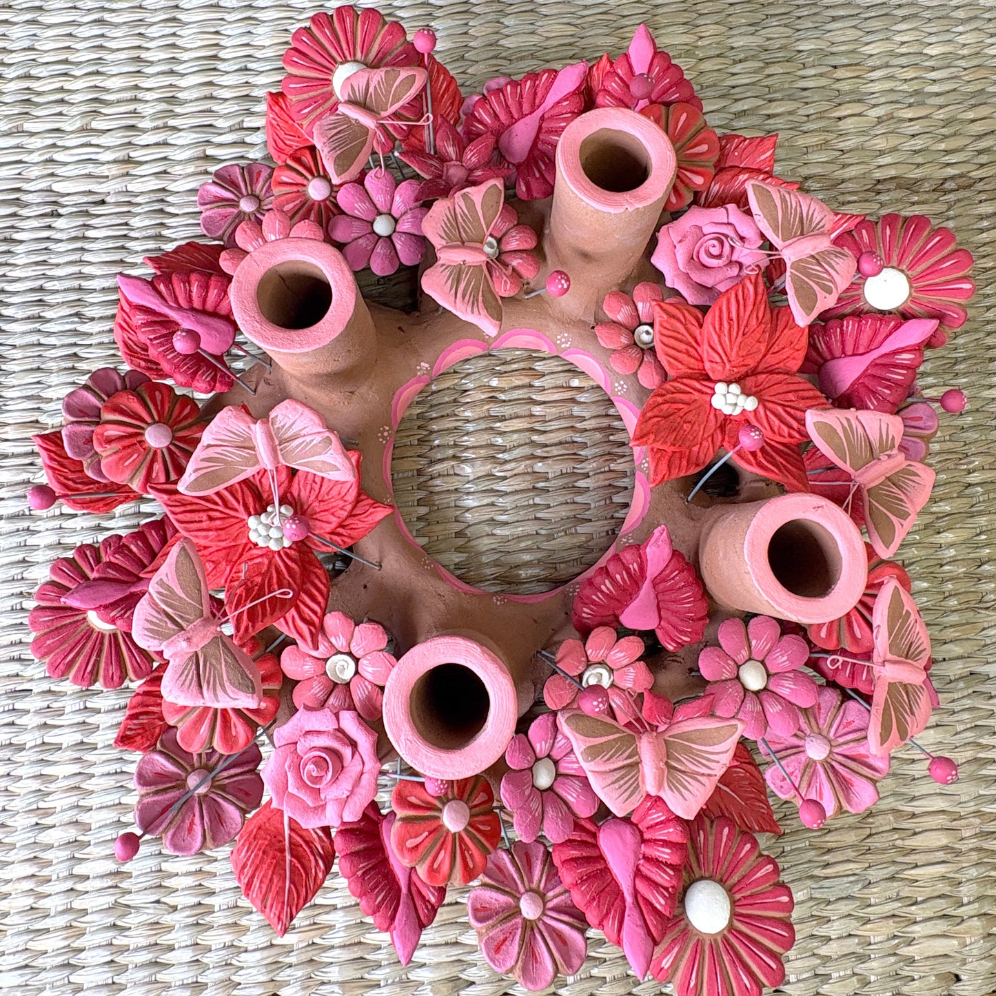 Handmade Mexican pottery clay , candle holder featuring intricate pink and red decorations