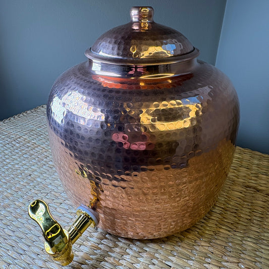 handcrafted hammered copper water dispenser. Capacity for 13 litters