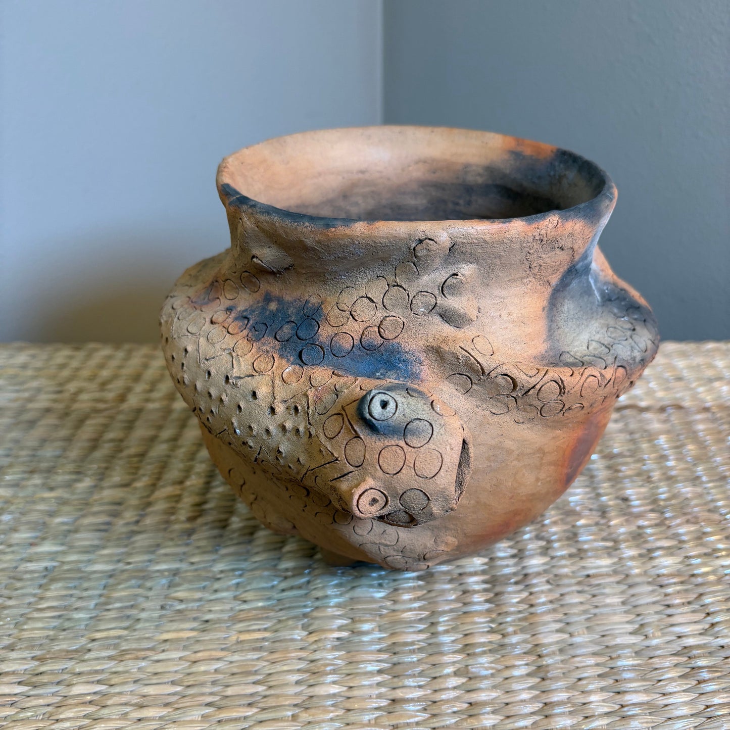 Clay Vase is designed for decorative use. It's natural , porous clay may allow moisture to seep.