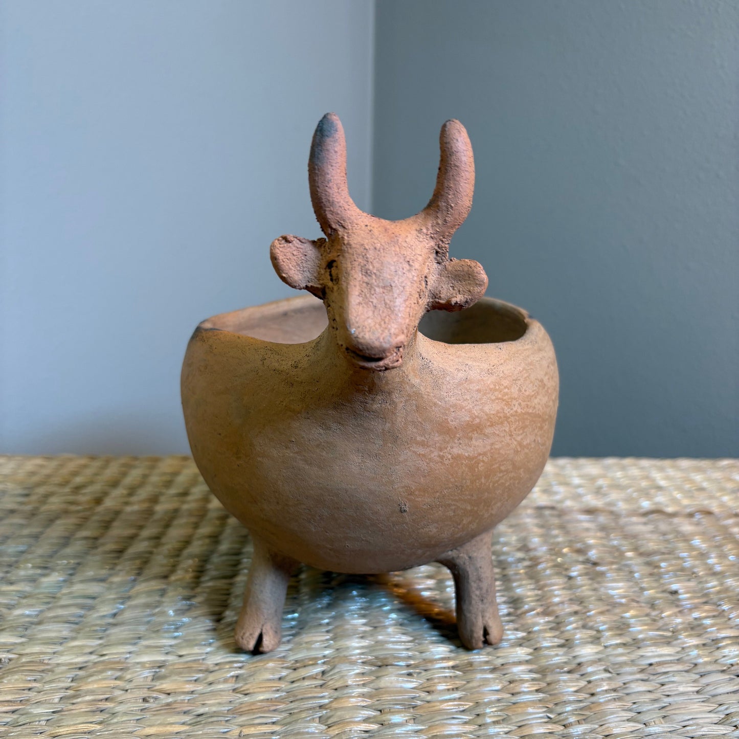 "Pot-Bull clay planter"A sculptural clay from handcrafted in Zipiajo, Michoacan-shaped in the likeness of a single animal.Each figure is a personal ancestral technique and smoke-fired for organic depth and character.