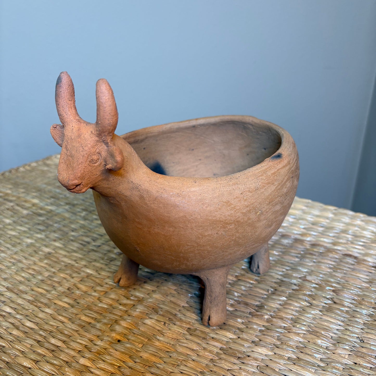 "Pot-Bull clay planter"A sculptural clay from handcrafted in Zipiajo, Michoacan-shaped in the likeness of a single animal.Each figure is a personal ancestral technique and smoke-fired for organic depth and character.