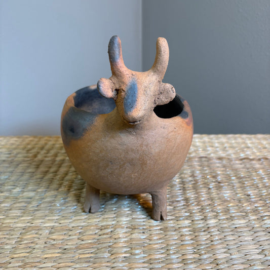 "Pot-Bull clay planter" A sculptural clay from handcrafted in Zipiajo, Michoacan-shaped in the likeness of a single animal.Each figure is a personal ancestral technique and smoke-fired for organic depth and character.