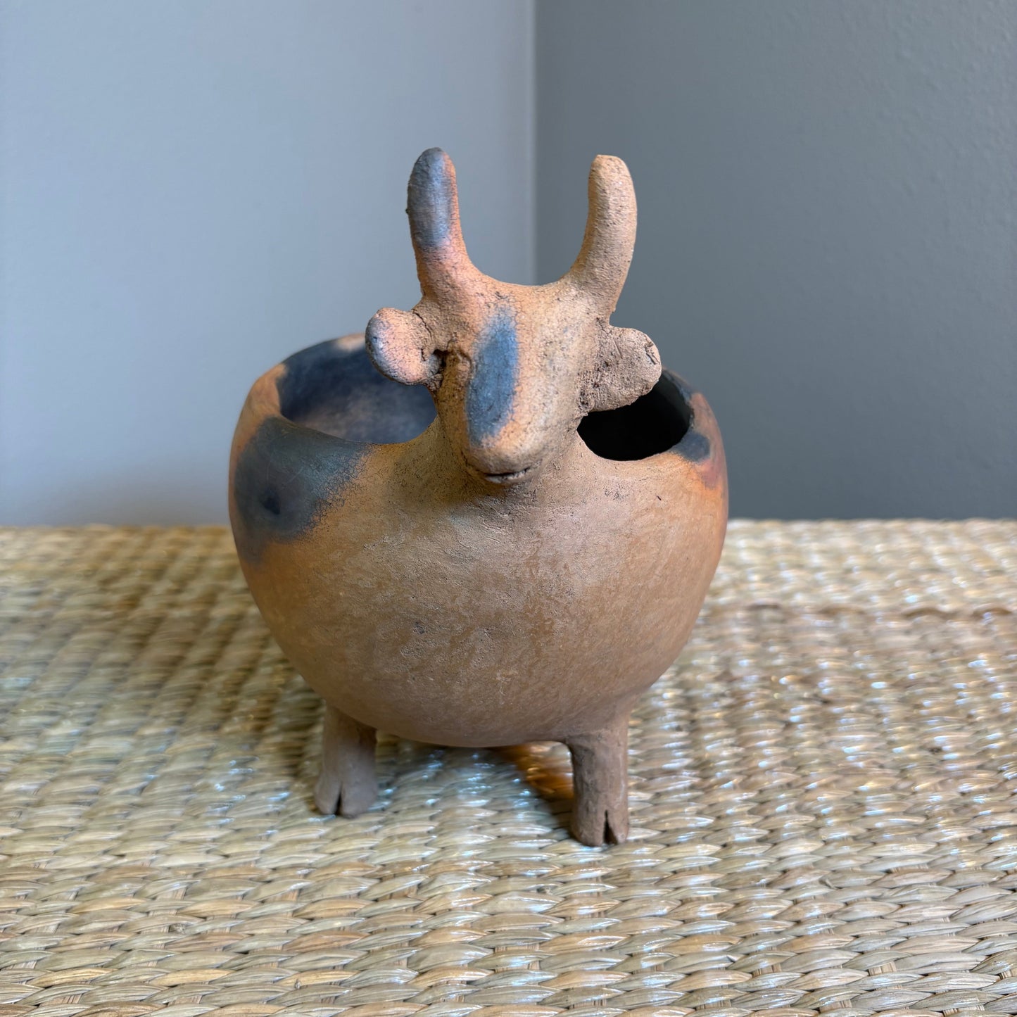 "Pot-Bull clay planter"A sculptural clay from handcrafted in Zipiajo, Michoacan-shaped in the likeness of a single animal.Each figure is a personal ancestral technique and smoke-fired for organic depth and character.