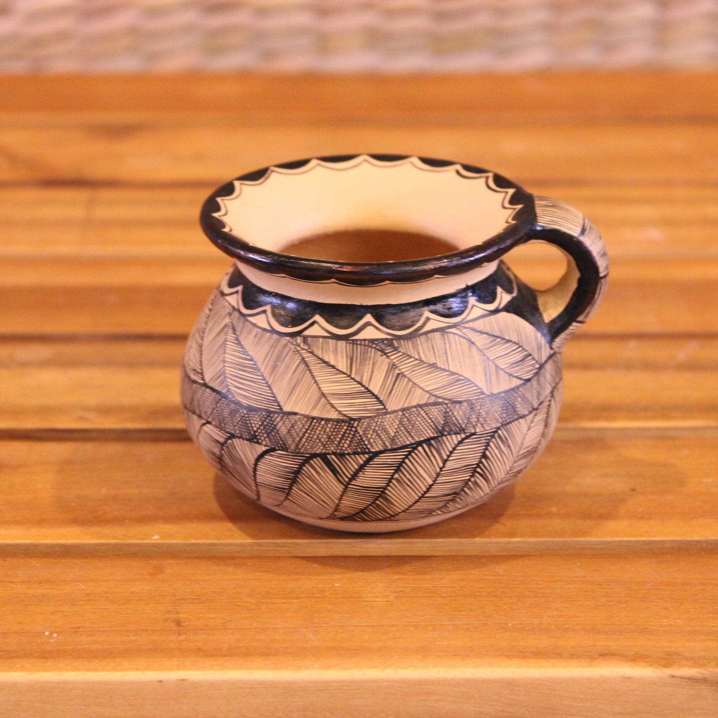 Little cup with handle hand painted in color black and beige