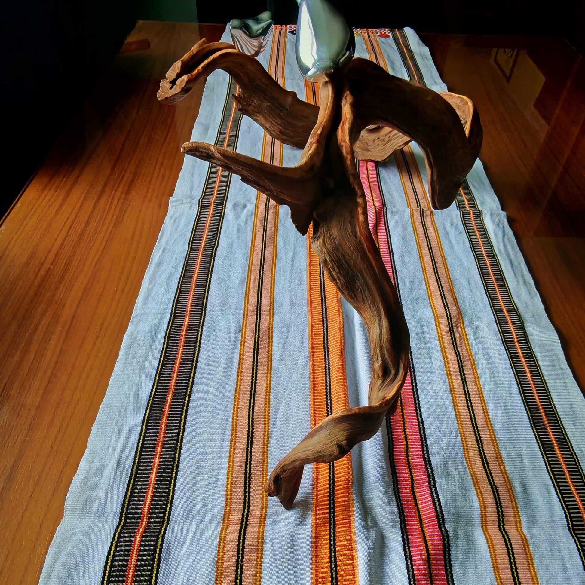 Colorful handwoven table runner close-up - authentic Mexican home decor