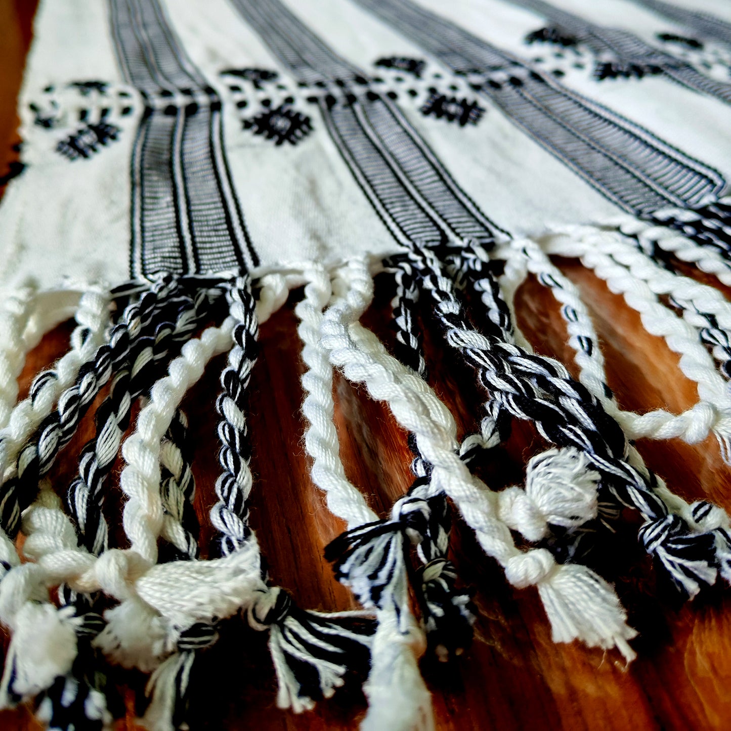 Traditional handwoven table runner close-up - authentic Mexican decor