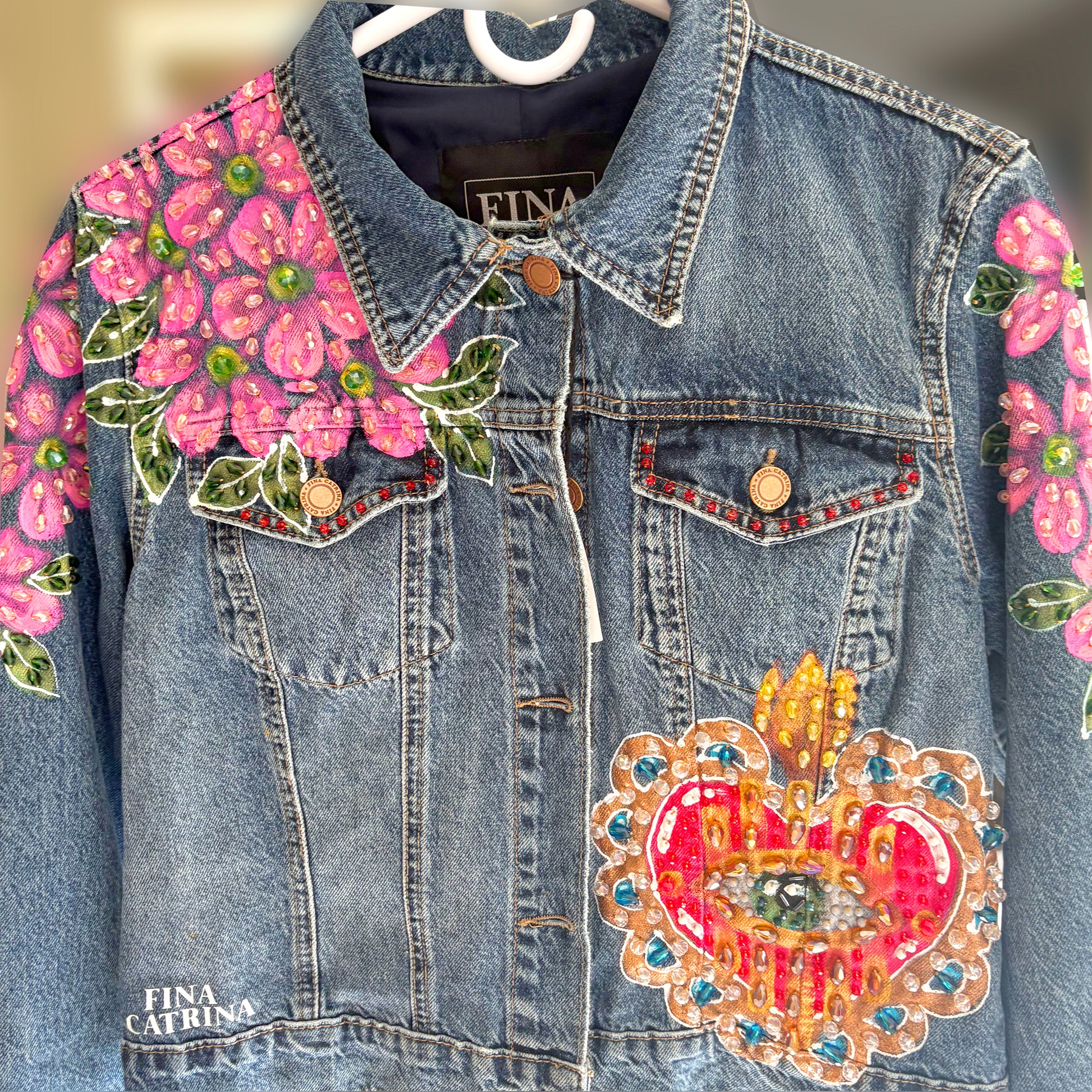 Hand-embroidered denim jacket with hearts and eyes design - Mexican artisan fashion