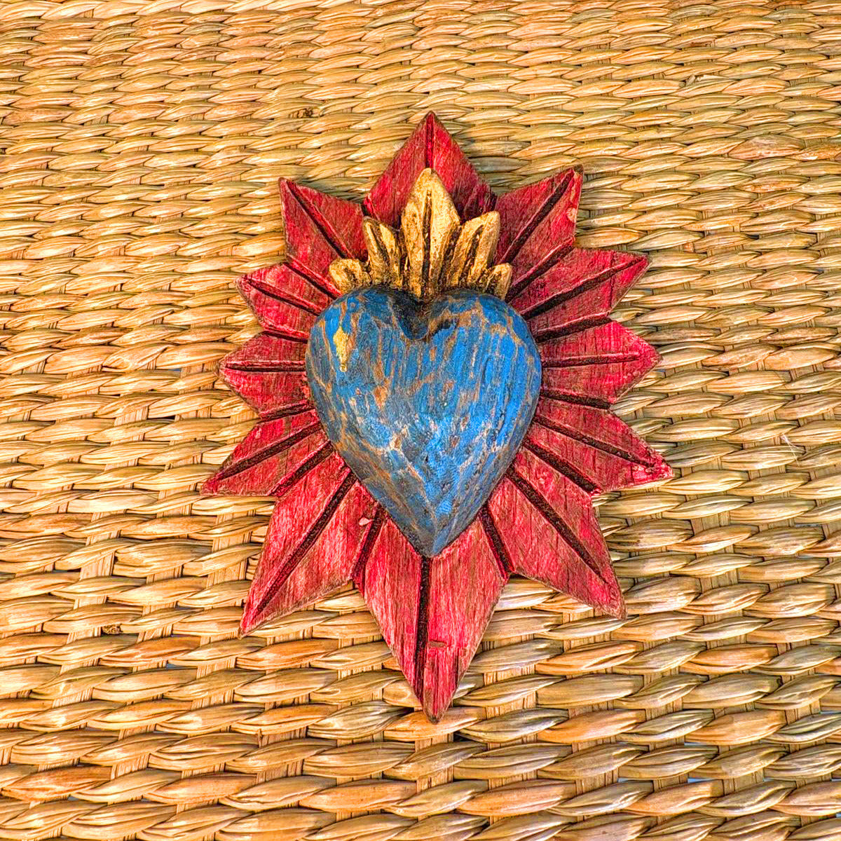 Carved wood heart hand painted.