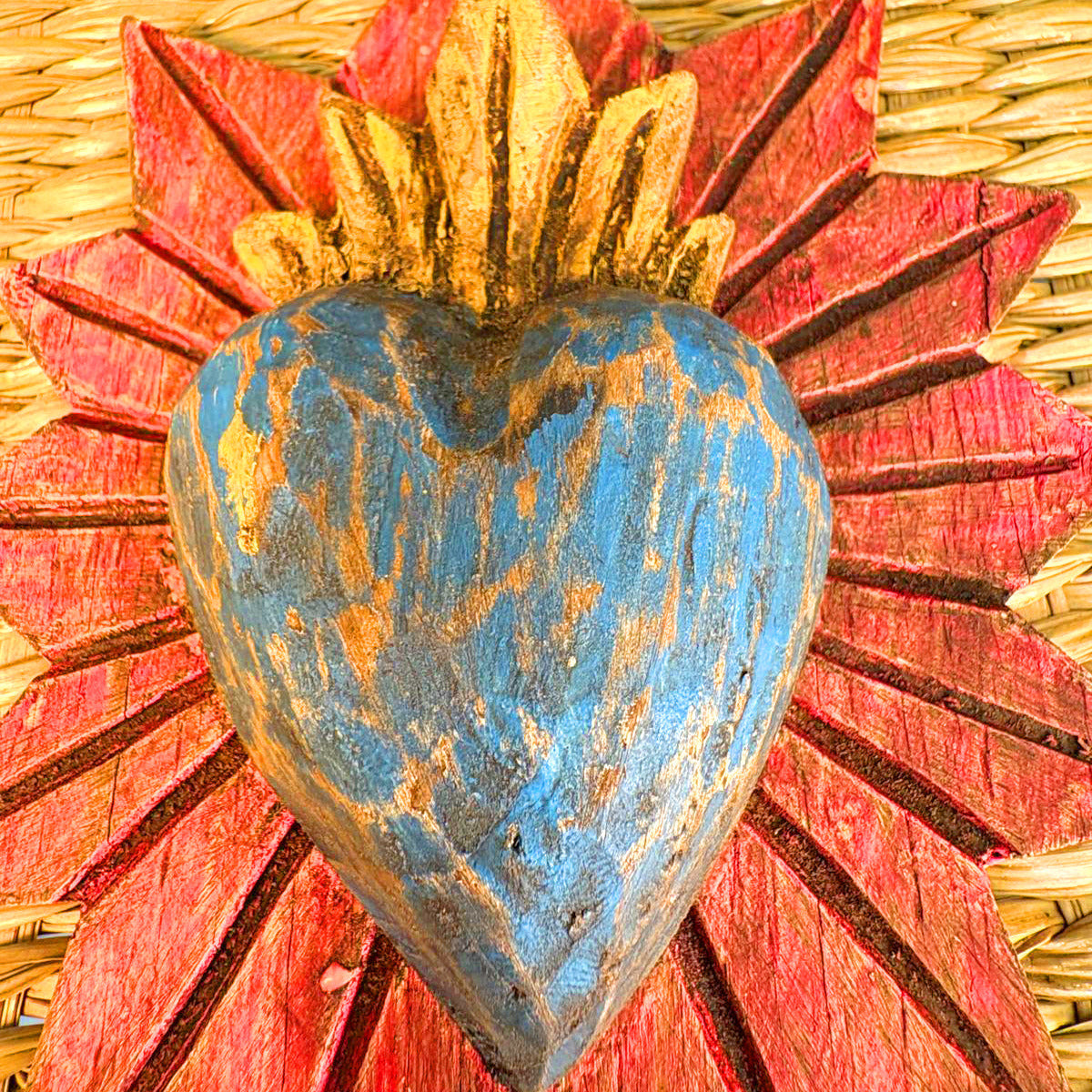 Carved wood heart hand painted.
