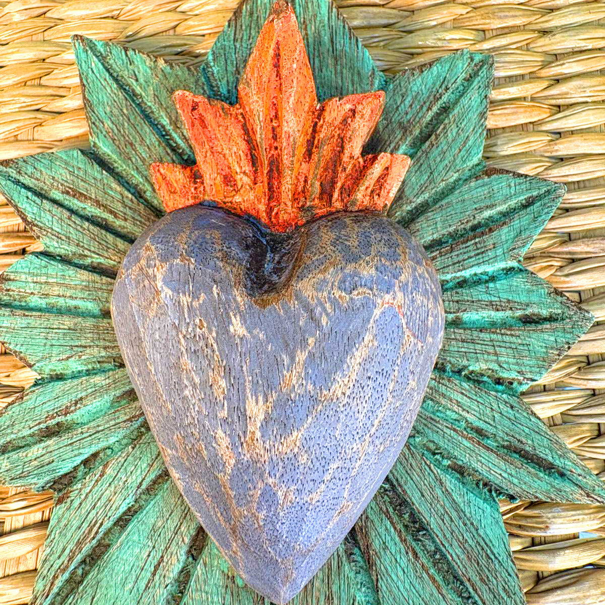 Carved wood heart hand painted.