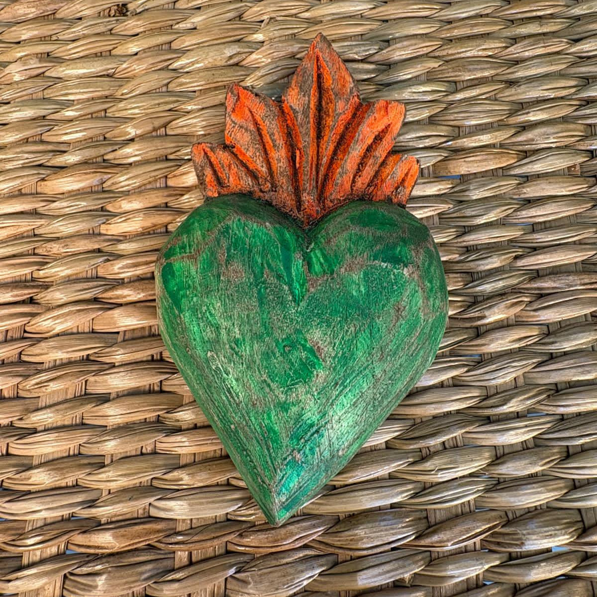 Carved wood heart hand painted.