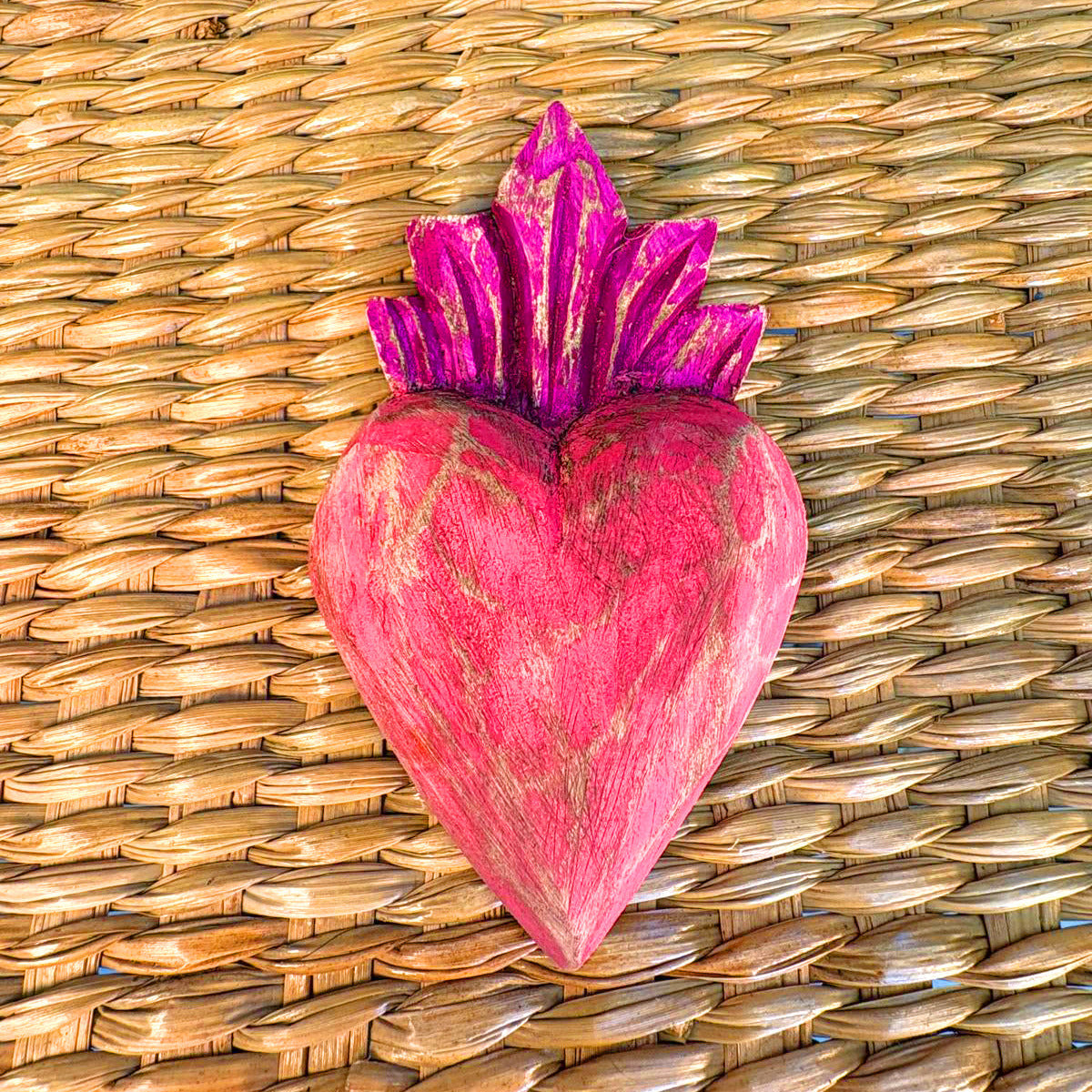 Carved wood heart hand painted.