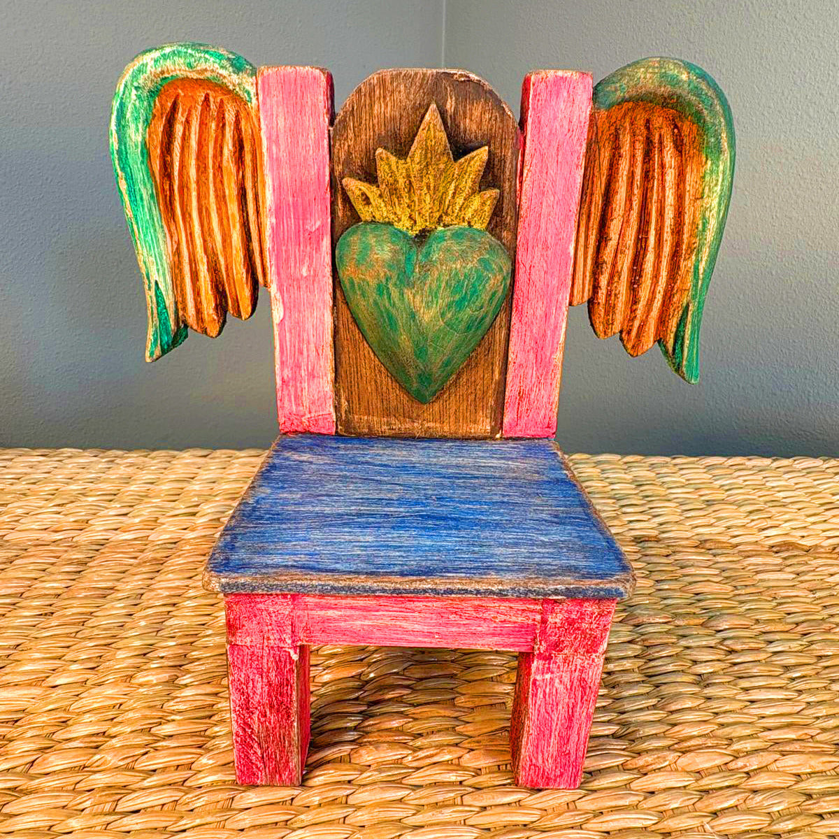 Carved wood chair hand painted.