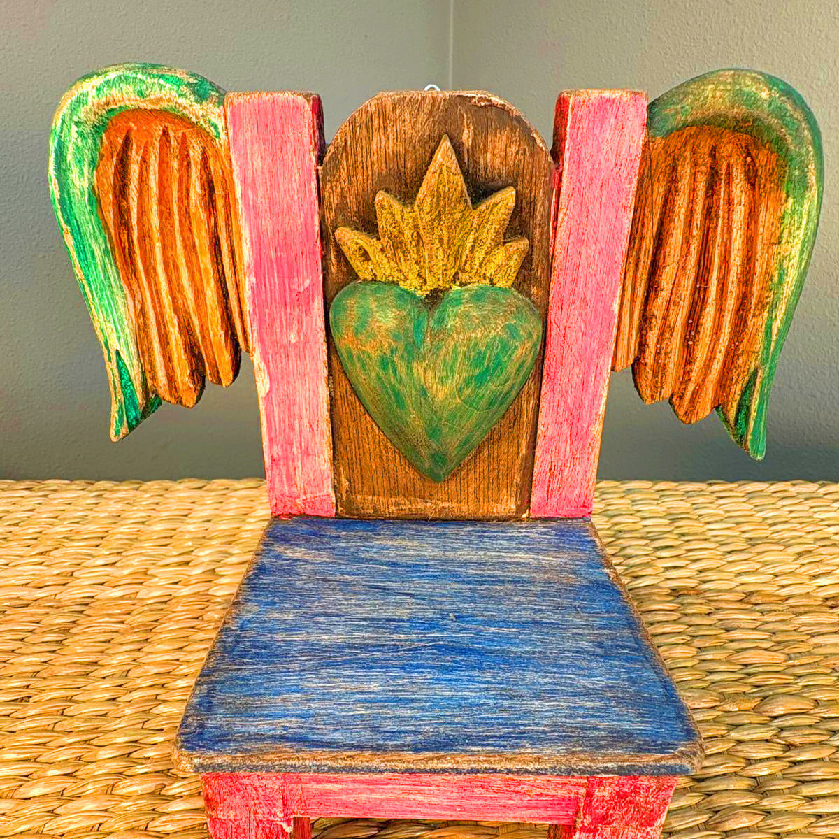 Carved wood chair hand painted.