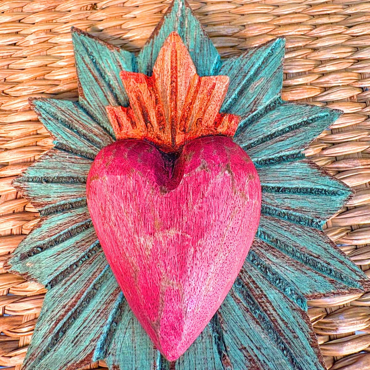 Carved wood heart hand painted.