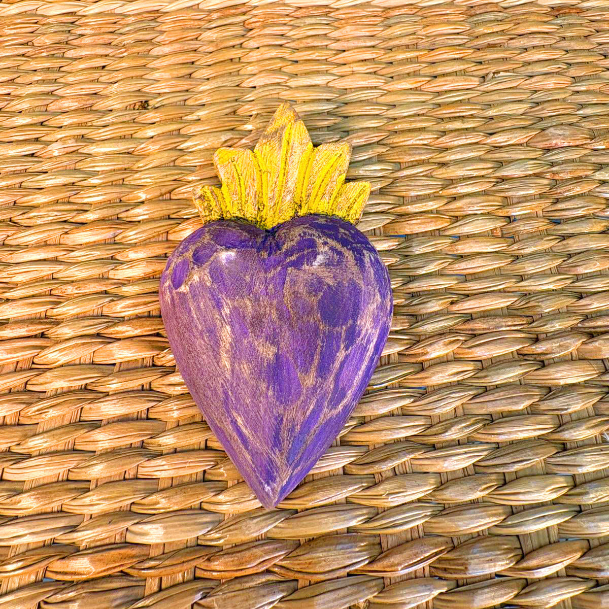 Carved wood heart hand painted.