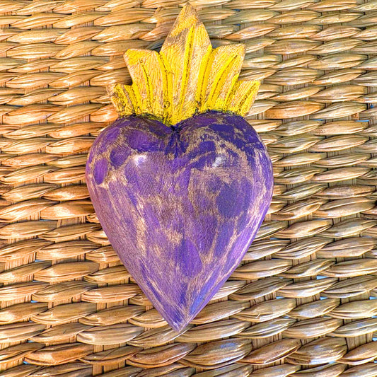 Carved wood heart hand painted.